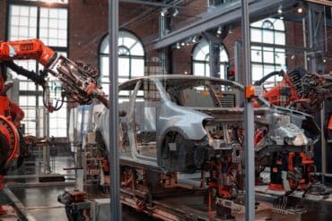 a car being assembled at a factory as the threat of another chip shortage looms