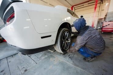 Dodge challenger in service bay