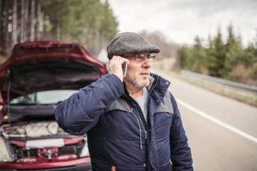 Man calling for help because car broken down