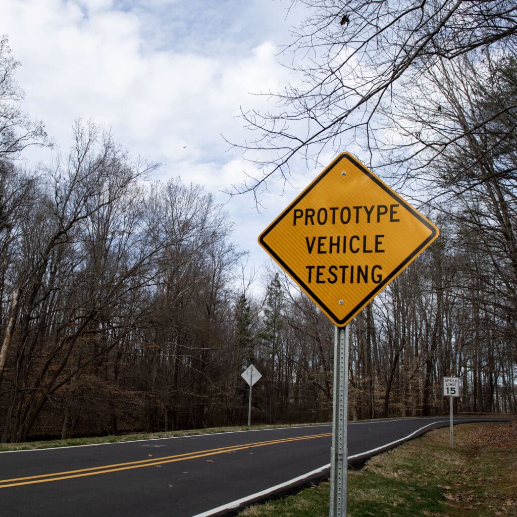 a yellow sign marks the nc A&t self-driving car rural test track at gateway north