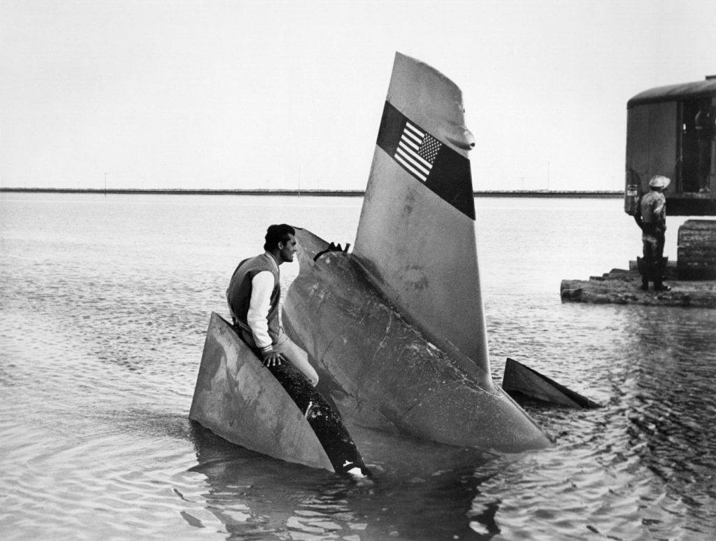 Examining the wreckage the next day. Photo: Bob Davids. From Speed Duel: The Inside Story of the Land Speed Record in the Sixties by Samuel Hawley, with permission from Firefly Books Ltd. 