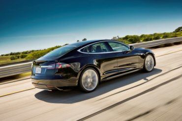 Tesla Model S Black Rear In Motion